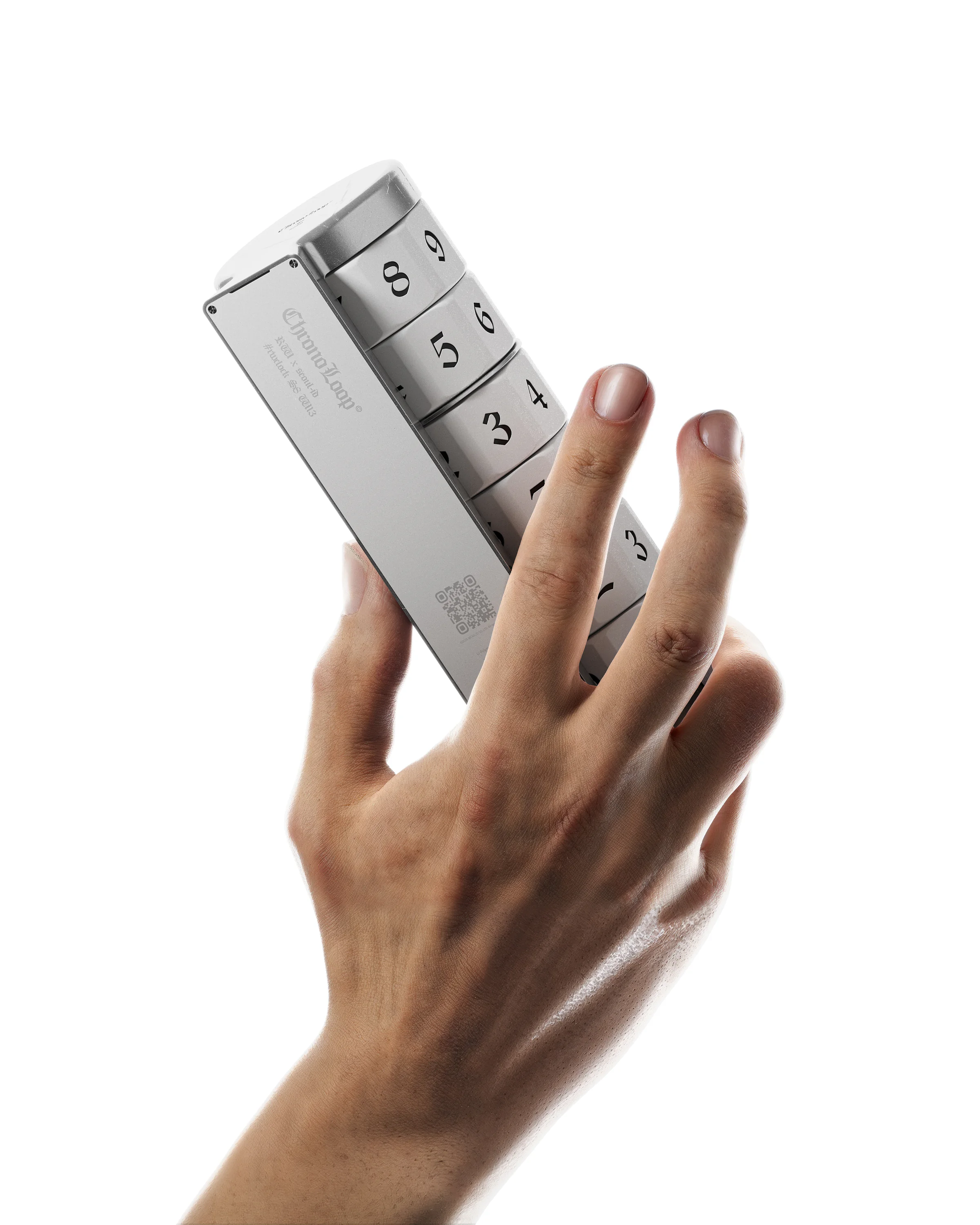 Chronoloop held in one hand to show the scale and repeating side numerals