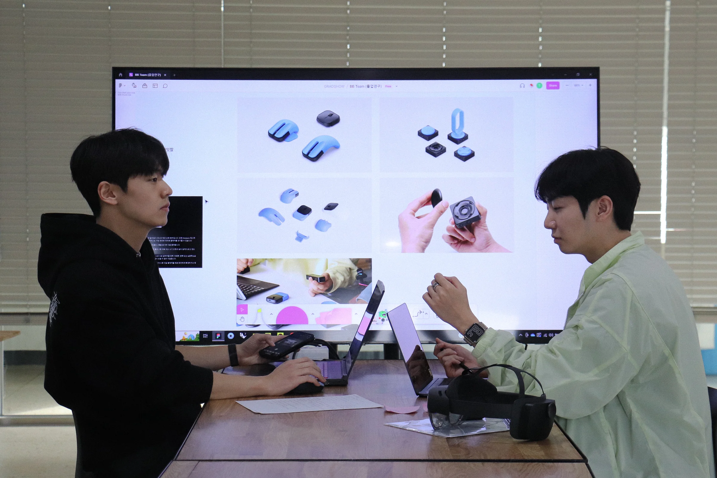 Design team reviewing NXC hardware and interaction concepts