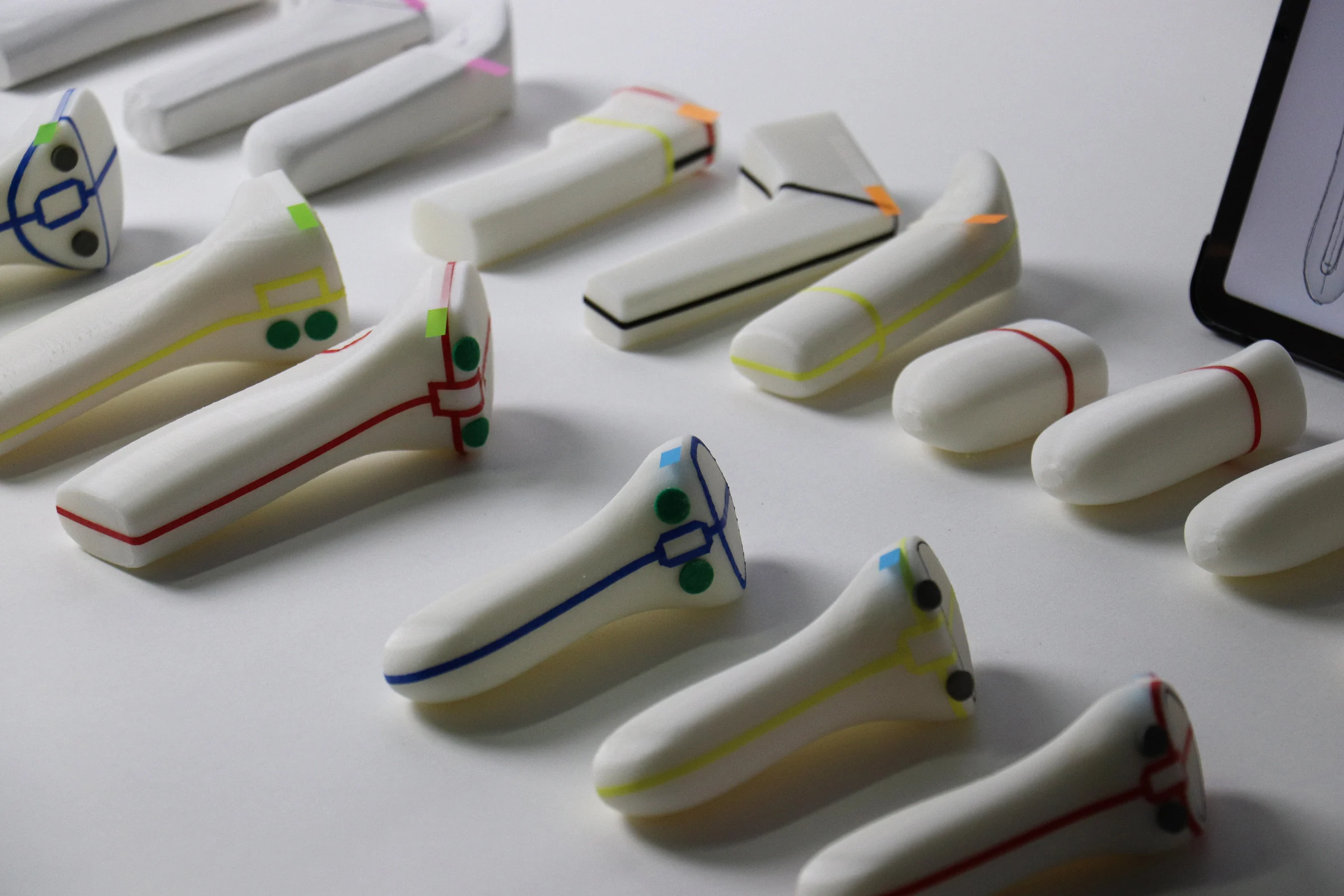Color-coded NXC controller prototypes used to compare form directions