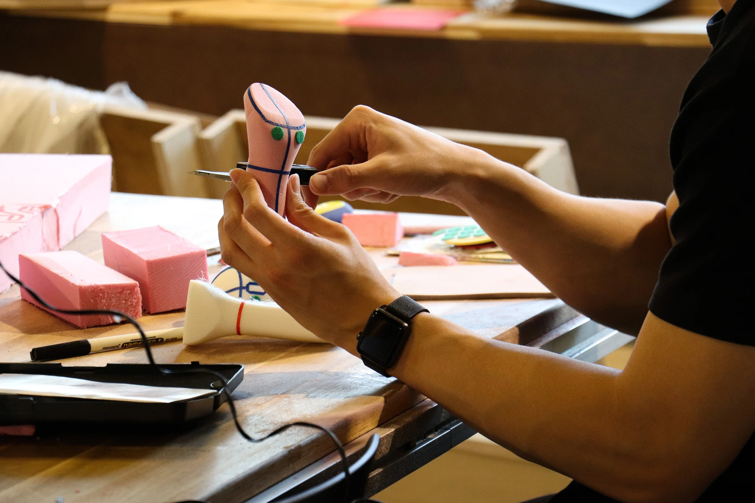 Designer marking interface and construction details on an NXC soft prototype