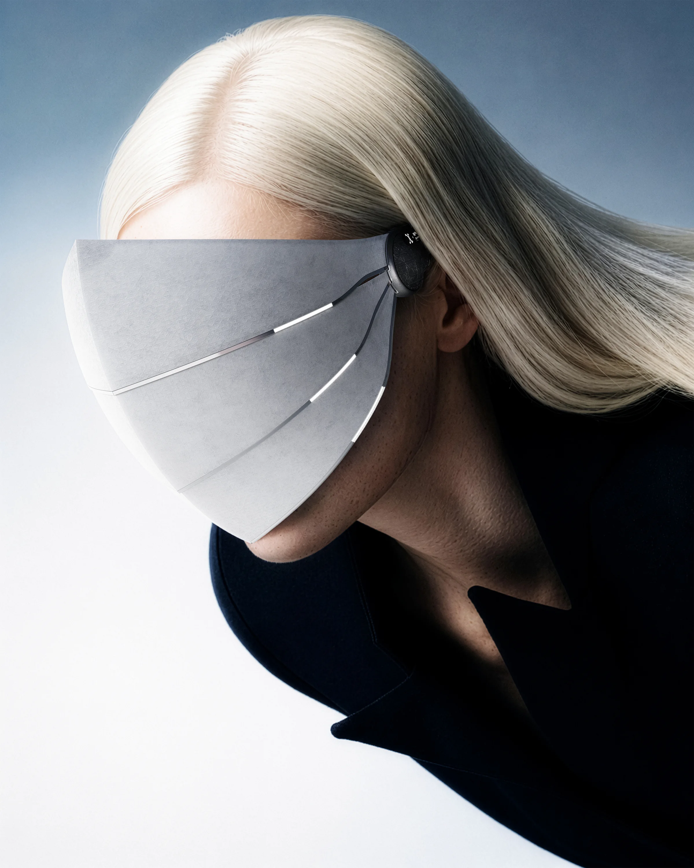 OBEX face-worn interface shown in a light studio profile