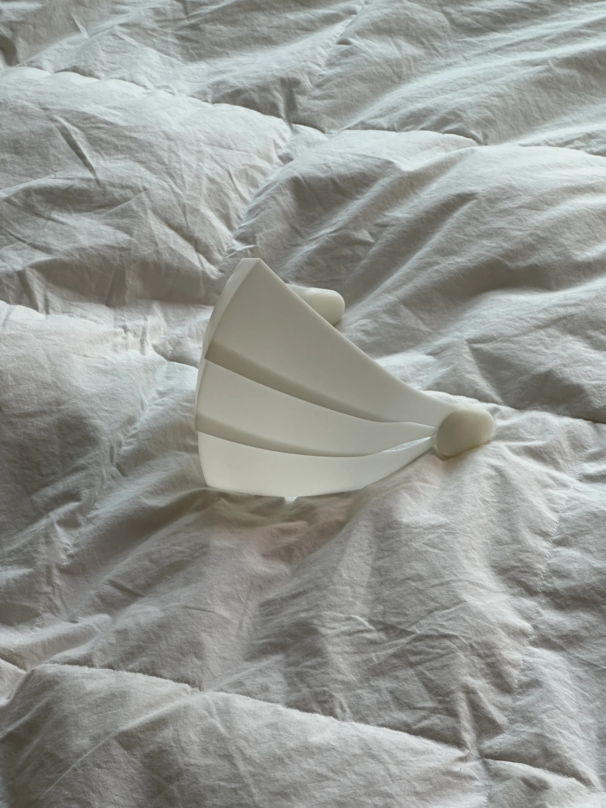 Early OBEX rapid prototype assembled on fabric to evaluate its folded structure